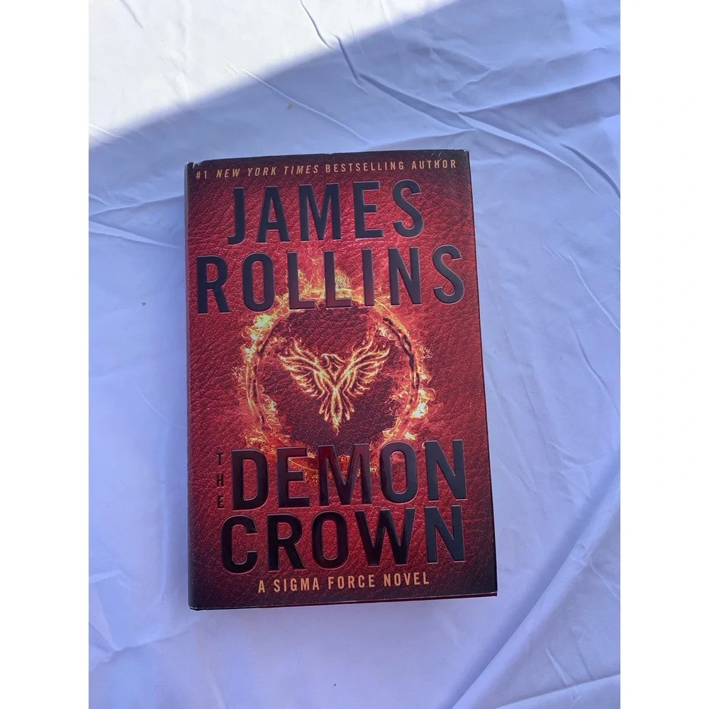 The demon‎ crown, a sigma force novel by James Rollins